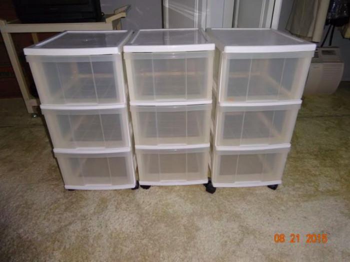 Three storage units with three drawers.