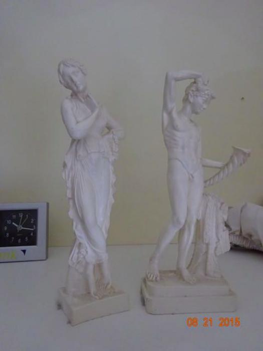 A pair of Grecian figurines