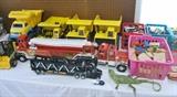 Toys including trucks, Legos and vintage trains