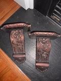 Set of ornately carved sconces