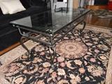Scrolled wrought iron and glass top coffee table
