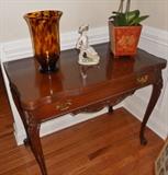 Lovely folding table that can be opened into a dining table (newly refurbished)--LLadro figurine of boy pushing flower cart in center of table                                                        