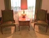 Upholstered arm chairs with cane detail at sides, matches dining room set and king bedroom set
