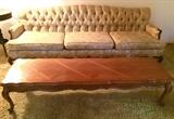 Lovely formal sofa and coffee table that matches end/side tables