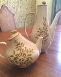 Tea and coffee pots matching set of mid-century stoneware dishes