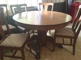 Antique oak table with leaf and six chairs