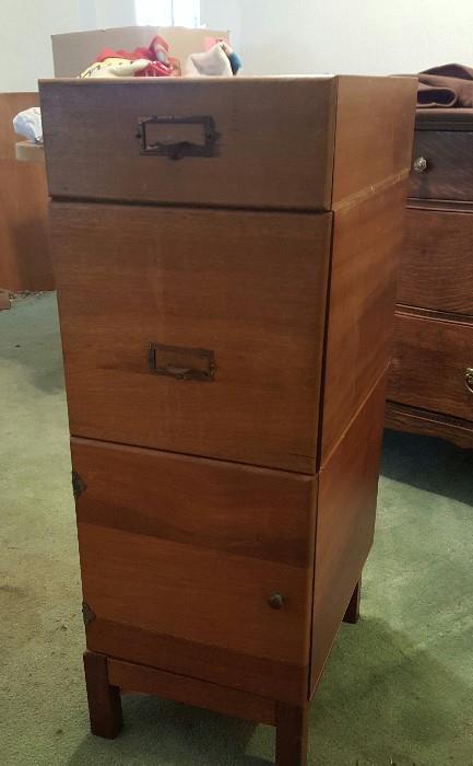 Unique late 1800s 4 piece maple file cabinet system includes lower cabinet, large file drawer, cash or letter drawer and pedestal.