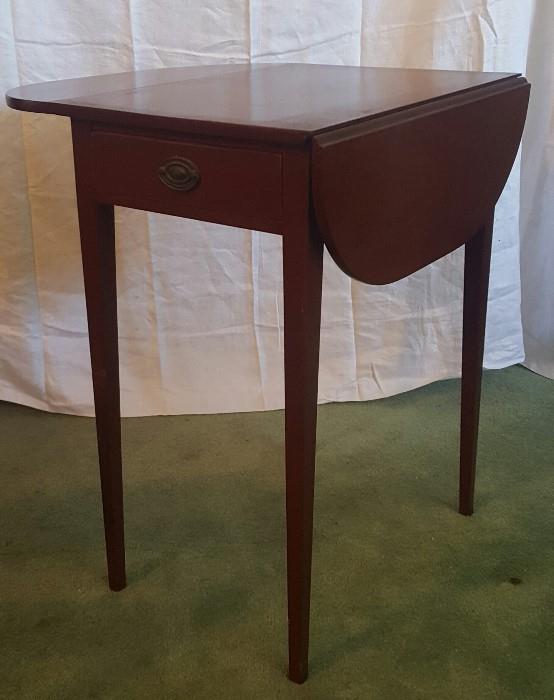 Pair of 1920s drop leaf mahogany side tables with small drawer.
