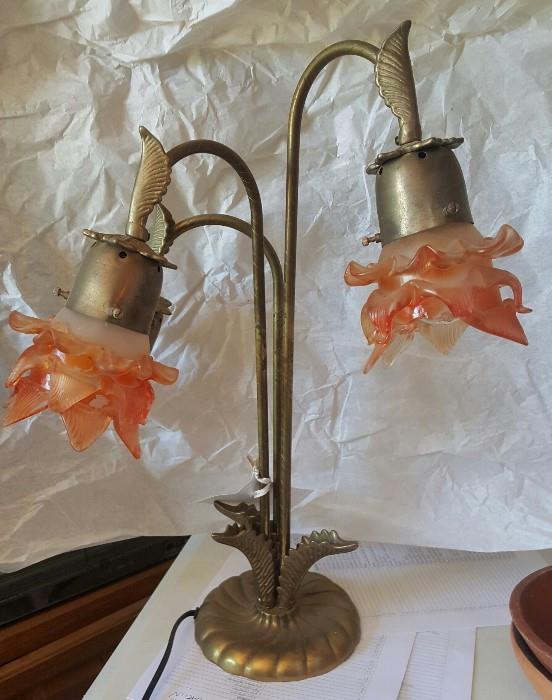 1920s French art nouveau bronze and brass gooseneck lamp with 3 arms. Rare apricot color frosted rose glass petal shades. Two shades are on and the 3rd is slightly damaged but wrapped in tissue and included. This is a lovely lamp.