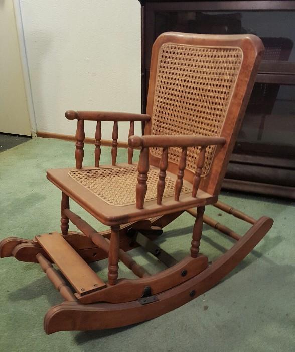 Early 1900s children rocker with cane seat and back. Maple.