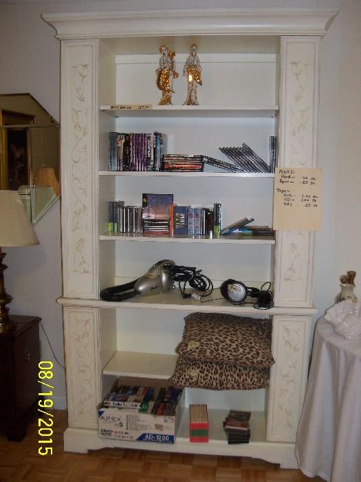 This is a white bookcase by Stanly Furn Co.