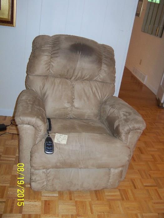 Lift chair, works good ...needs a cleaning or cover on head rest area.