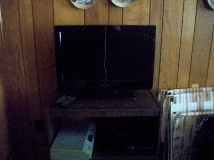 26 inch flat screen tv , dvd player and stand