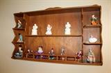 Wall shelf with figurines
