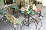 Outdoor glass table and folding chairs