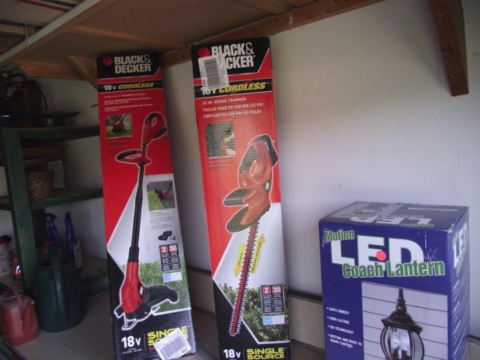 New In Box - Black & Decker cordless weed wacker & hedge trimmer, plus extra batteries; LED motion sensor outdoor light