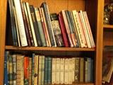There are so many books of all types including antique.  Some are in the den, back porch, and lots that were packed up have been moved to the basement