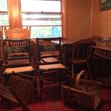 Antique tables and chairs and magazine rack