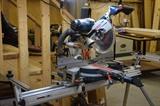 Bosch Model 4410 Miter Saw on Bosch  on TracRac T3B Vacuum Attachment 