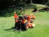 Rear View of Kubota Tractor, fluids are clean full, all systems function as they should, and with 60 inch mowing deck , it's a great machine for managing any sized property. $10,500