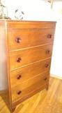 chest has faux tortis shell pulls