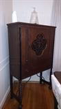 China Cabinet with turned legs and rod iron work