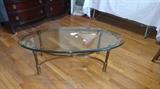 Heavy oval glass top coffee table