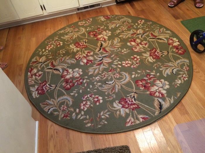 Round area rug that matches the 8x11 and runner rugs 