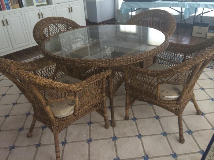 Rattan dining set with glass top