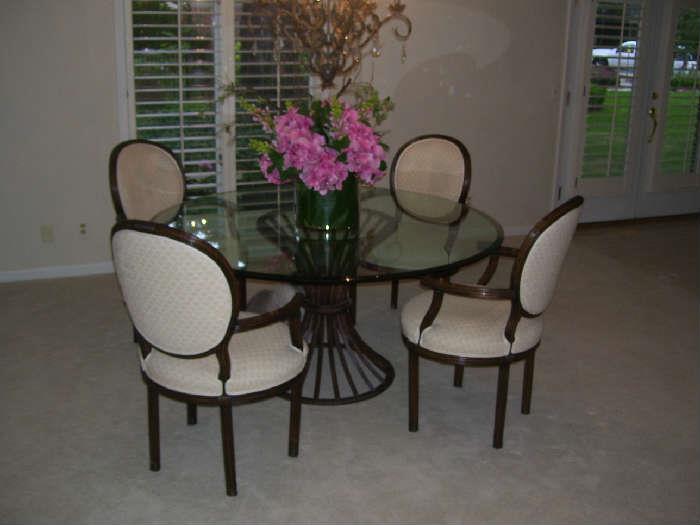 Beautiful glass top and metal base table with chairs by William Switzer