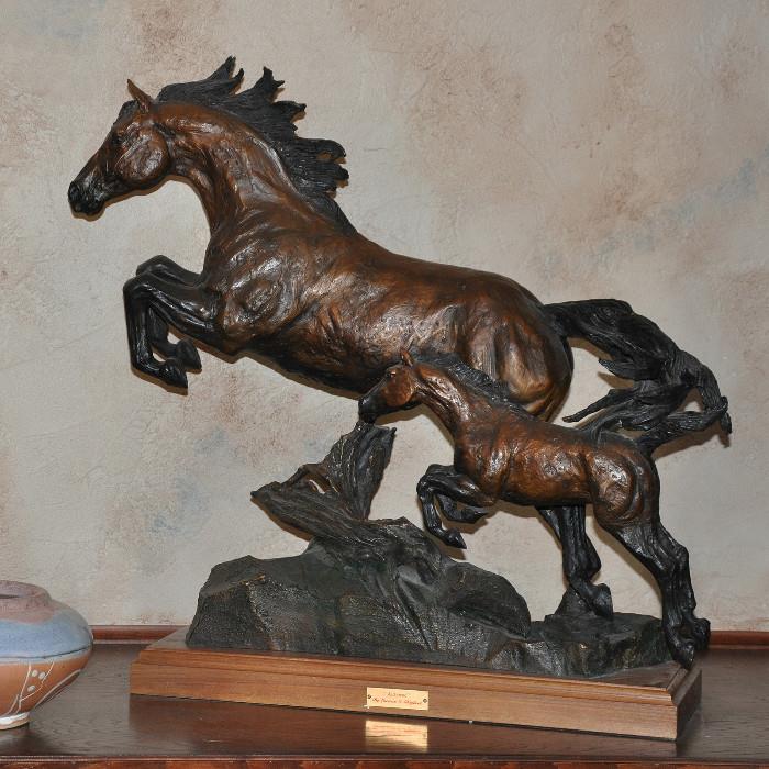 An original limited edition bronze by Lorenzo Ghiglieri entitled "Airbourne".  Signed on the front and dated 2000/April.  It is 25.5" tall and 30" wide.