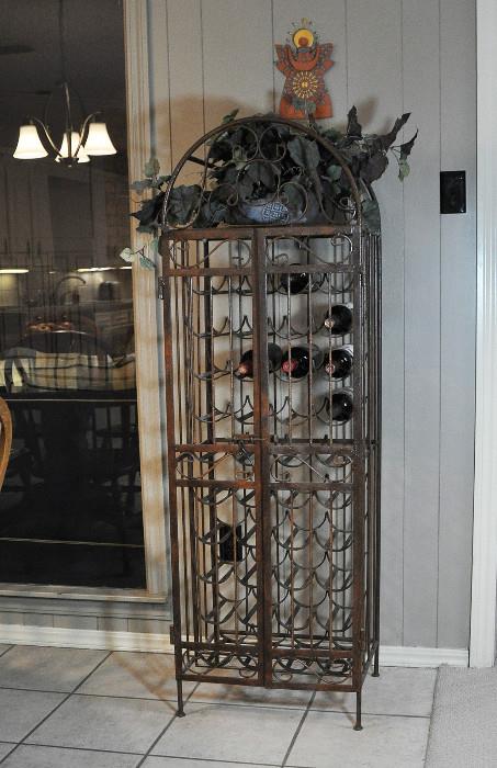 Very heavy wrought iron gated wine rack - holds 40 bottles