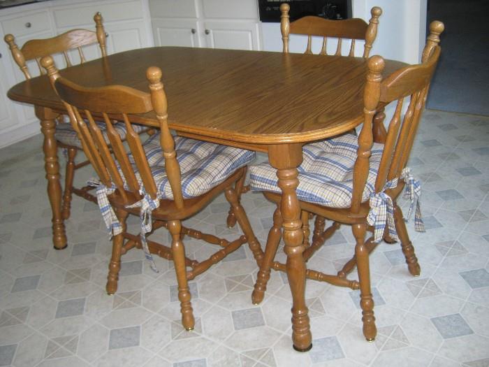 casual dining table (with two leaves) and four chairs