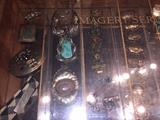 Assorted vintage jewelry. Beautiful silver and turquoise, inlaid belt buckles, mother of pearl, beaded bracelets and carved bone pieces.