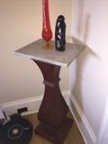 Wood and marble pedestal table
