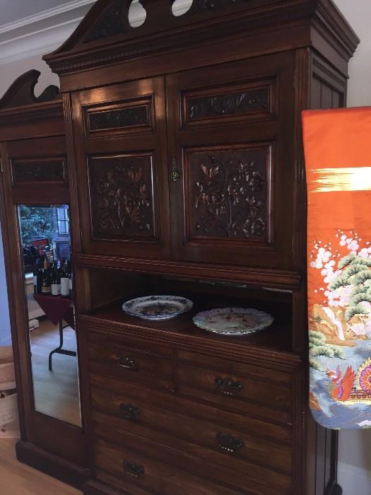 Antique Victorian Armoire with Carved Wood Panels. This piece was purchased in France and is believed to be from the Late 1800's