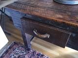A closer view of this very cool antique work bench; use as a VERY cool kitchen island or in any room to display everyday collectibles. Purchased in Portland at a well know antique shop.