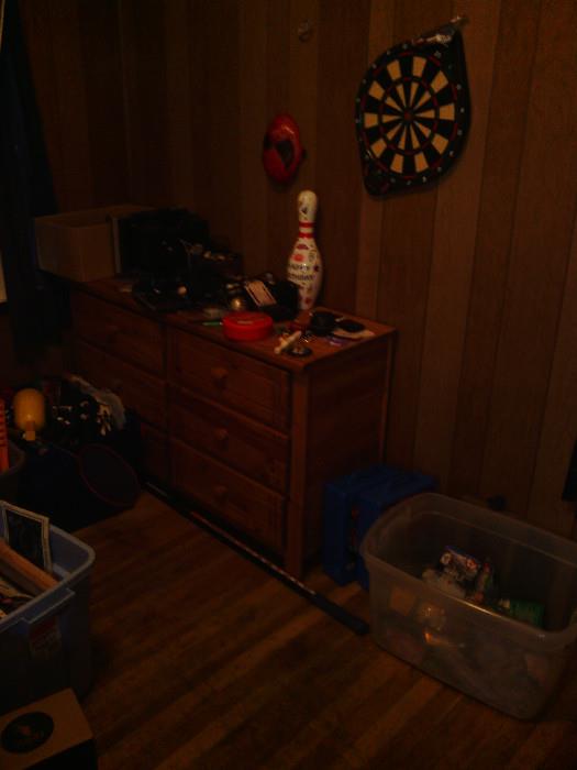 this dresser goes with the captains bed and the dartboard is only for plastic tips