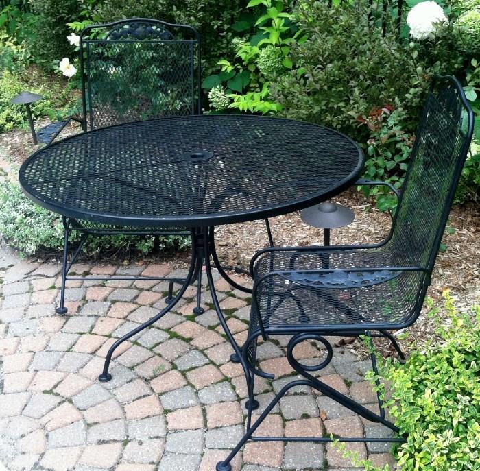 wrought iron bistro table and chairs