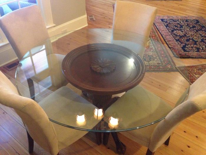 54" round glass top & claw foot pedestal base table with 4 suede-like chairs