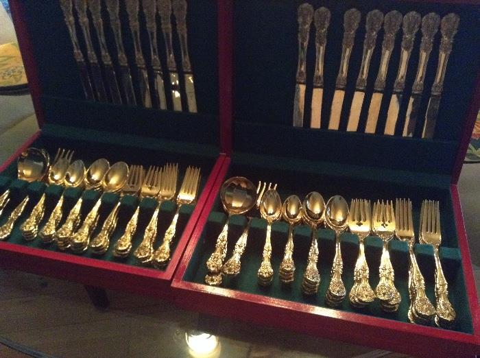 Gold tone flatware ~ service for 16 (two cases of 8 each)