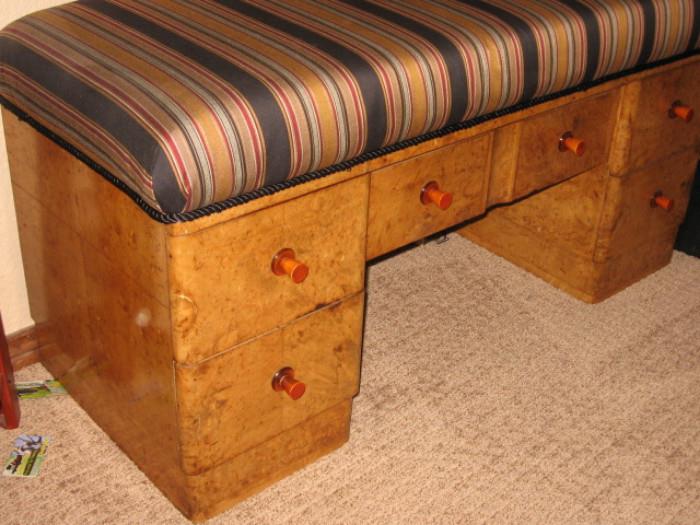 Birdseye maple cushioned bench with 5 drawers and original pulls. 