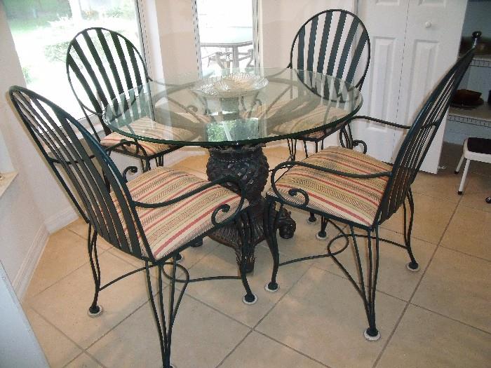 Beautiful cast metal dinette set with 4 chairs
