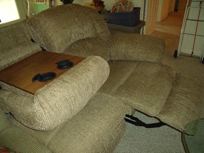 One recliner and console open