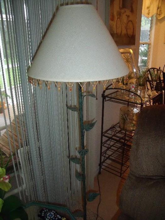 Floor lamp with leaves and beaded shade