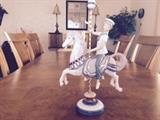 Lladro Boy on Carousel Retired 2001.  $250, sells on ebay and other sites for $500+.  In Excellent condition.