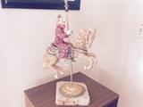 Porcelain Clown on Carousel Horse mounted on quartz paid $1500.00 Beautiful piece of art. $250.