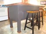 Kitchen island measures 71 3/4" wide, by 36 1/4" deep, by 37 1/4" high. Dark Grey with tile top, wood edge.