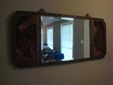 Antique hand carved Asian mirror measures 44 3/8" wide by 20 1/16" tall