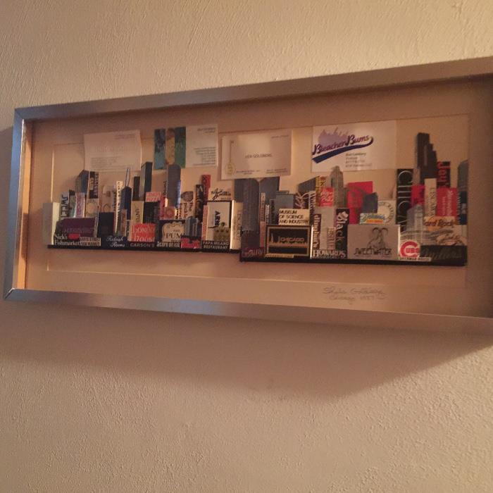 Skyline made from matches and business cards